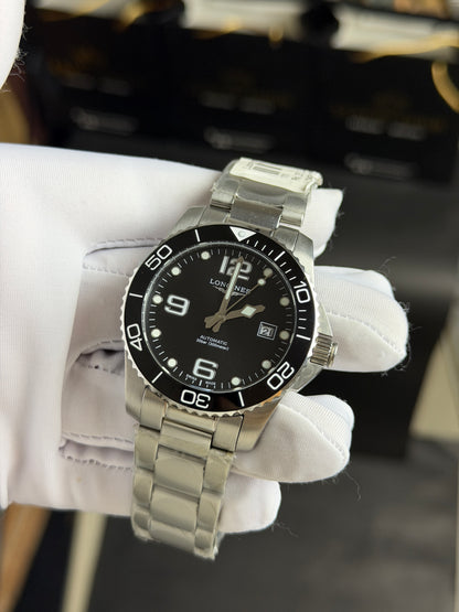 Silver with Black Dial.