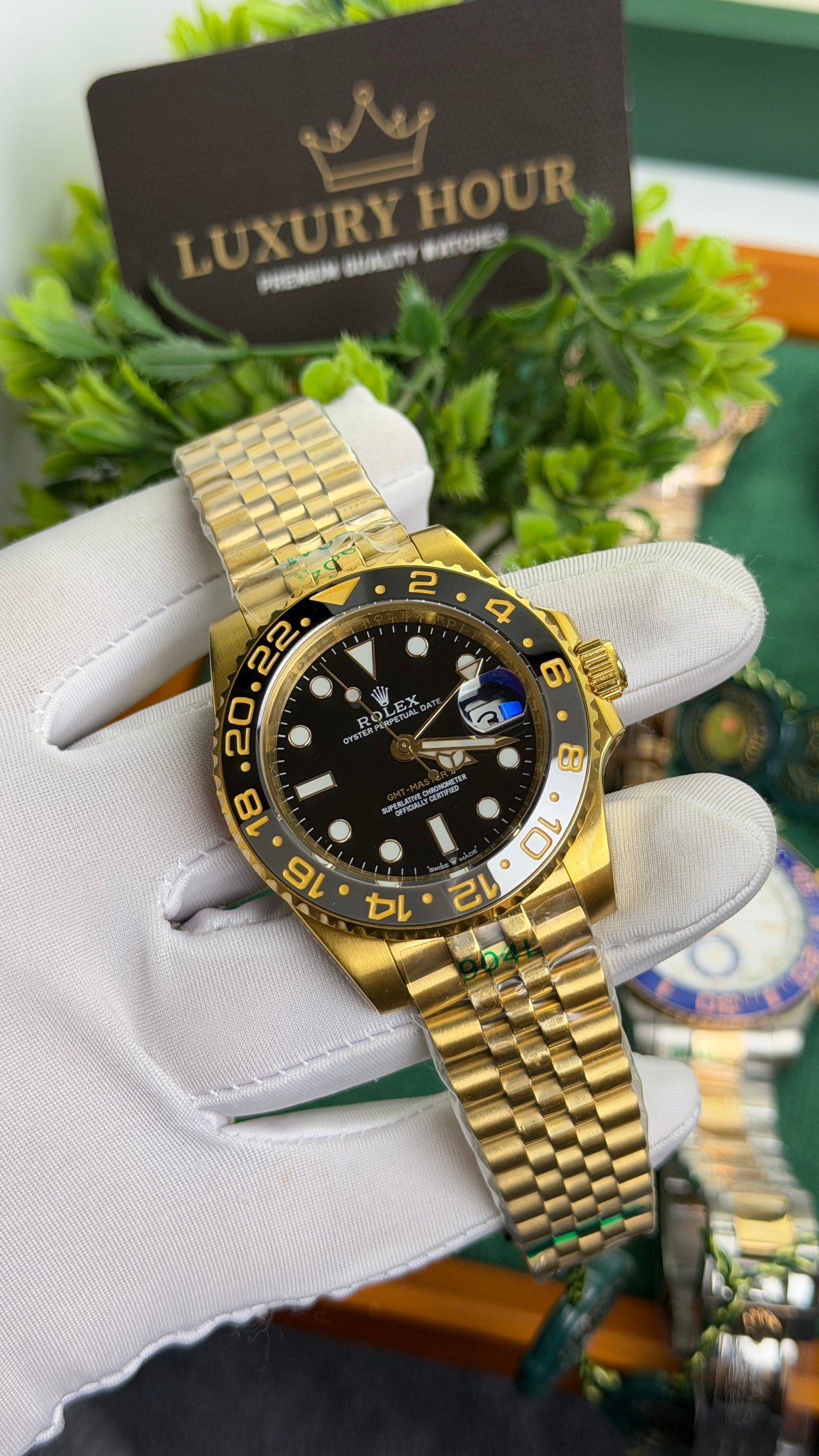 Yellow Gold with Black Dial.