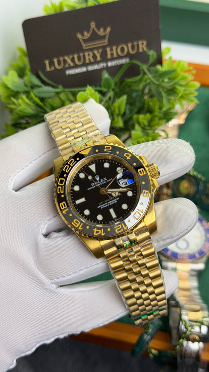 Yellow Gold with Black Dial.