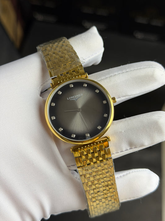 Yellow Gold with Grey Dial.