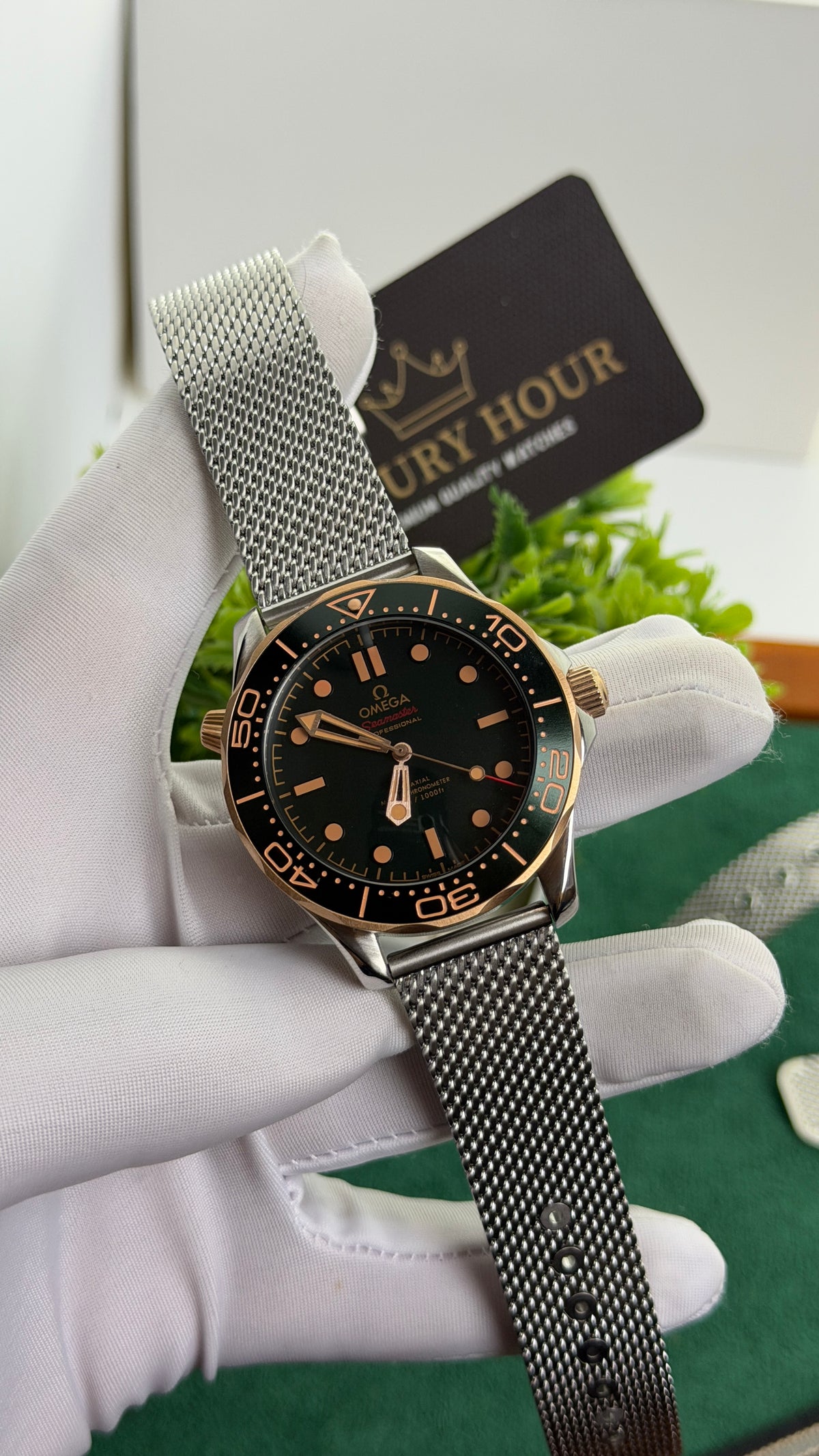 Rose Gold with Dark Green Dial.