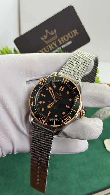 Rose Gold with Dark Green Dial.