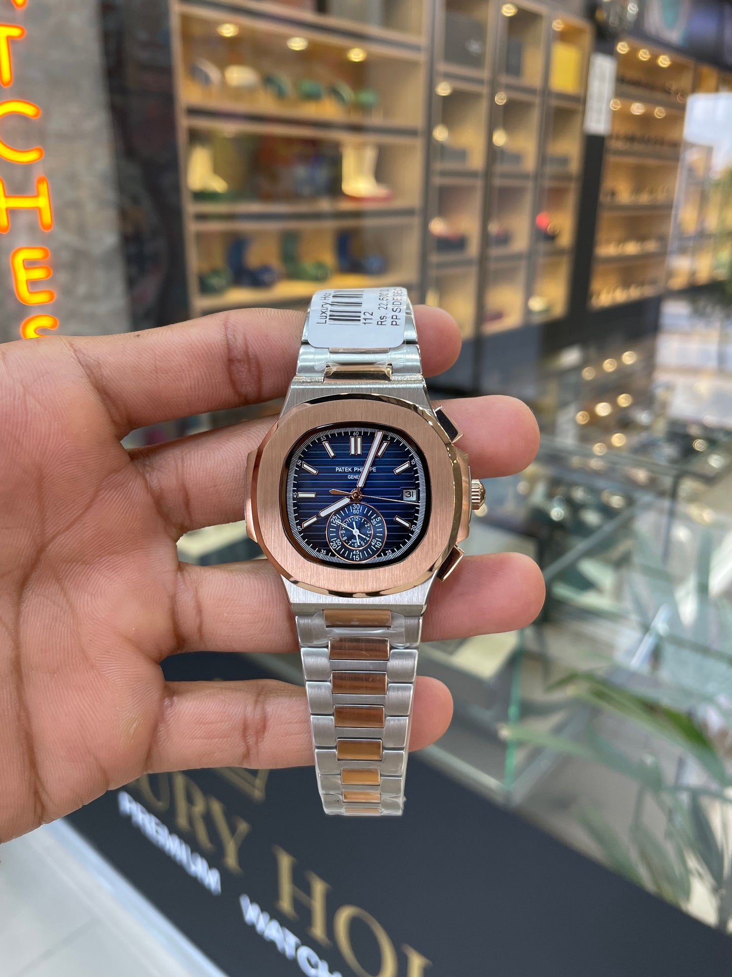 Rose gold two tone with blue dial