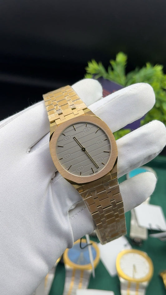 Yellow gold with grey dial