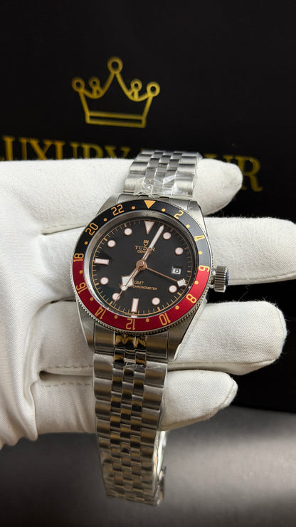 Silver with Black Dial.