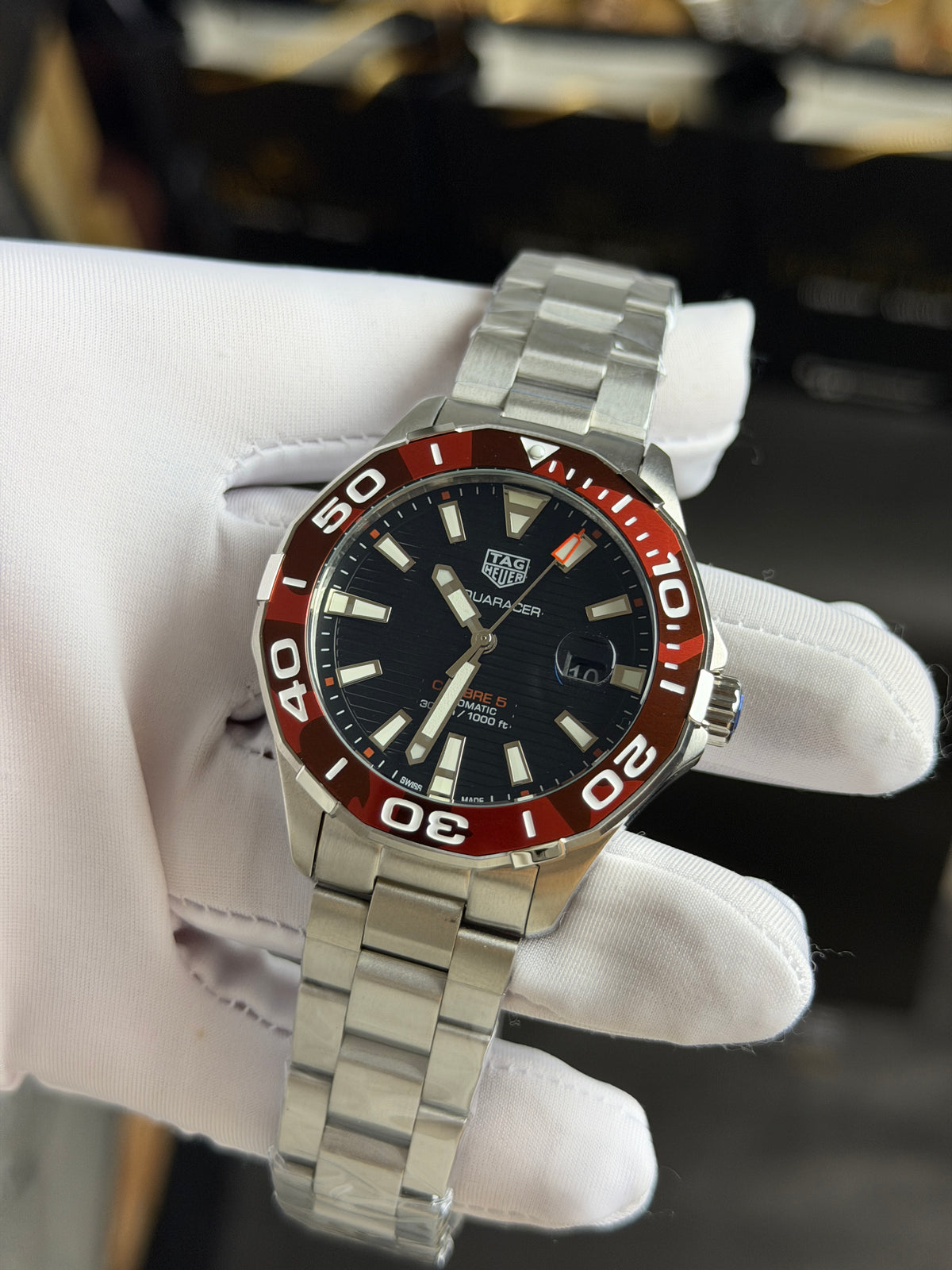 Silver with Black Dial.