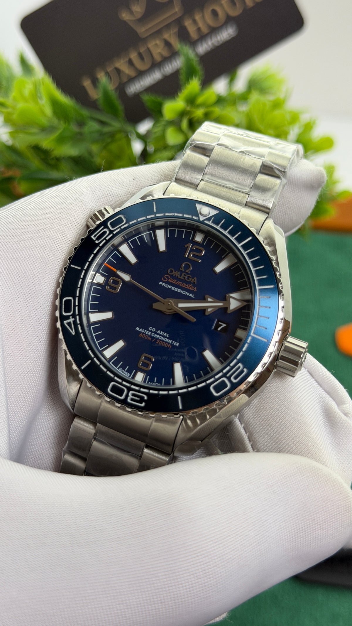 Silver with Blue Dial.