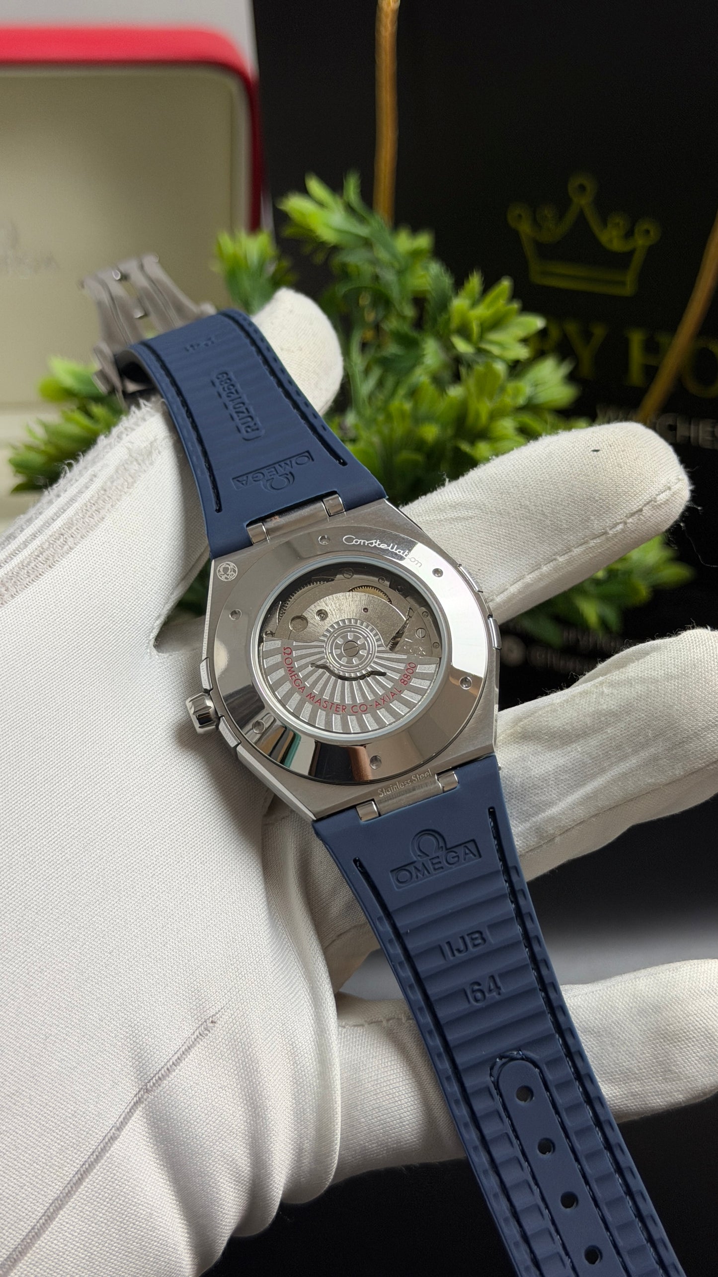 Silver with Green Dial.