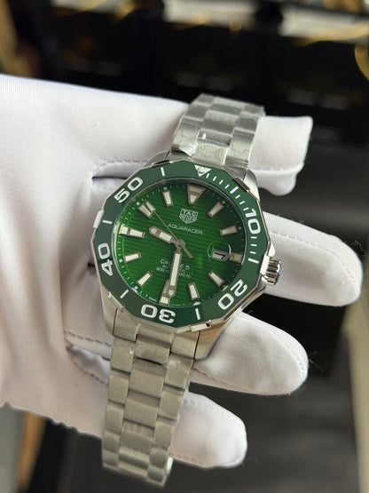 Silver with Green Dial.
