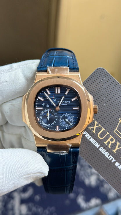 Rose Gold with Blue Dial.