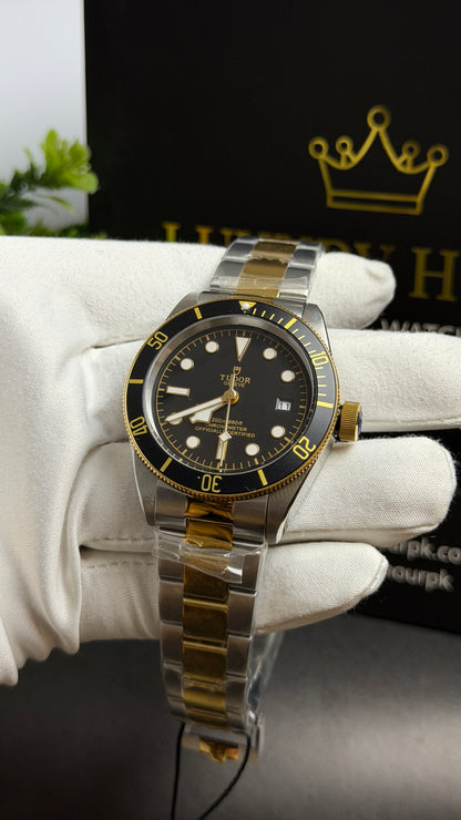 Yellow Gold Two Tone with Black Dial.