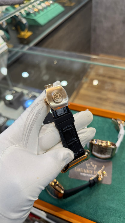 Rose Gold with Black Dial.
