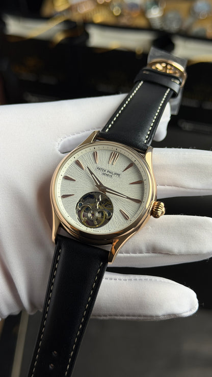Rose Gold with White Dial.