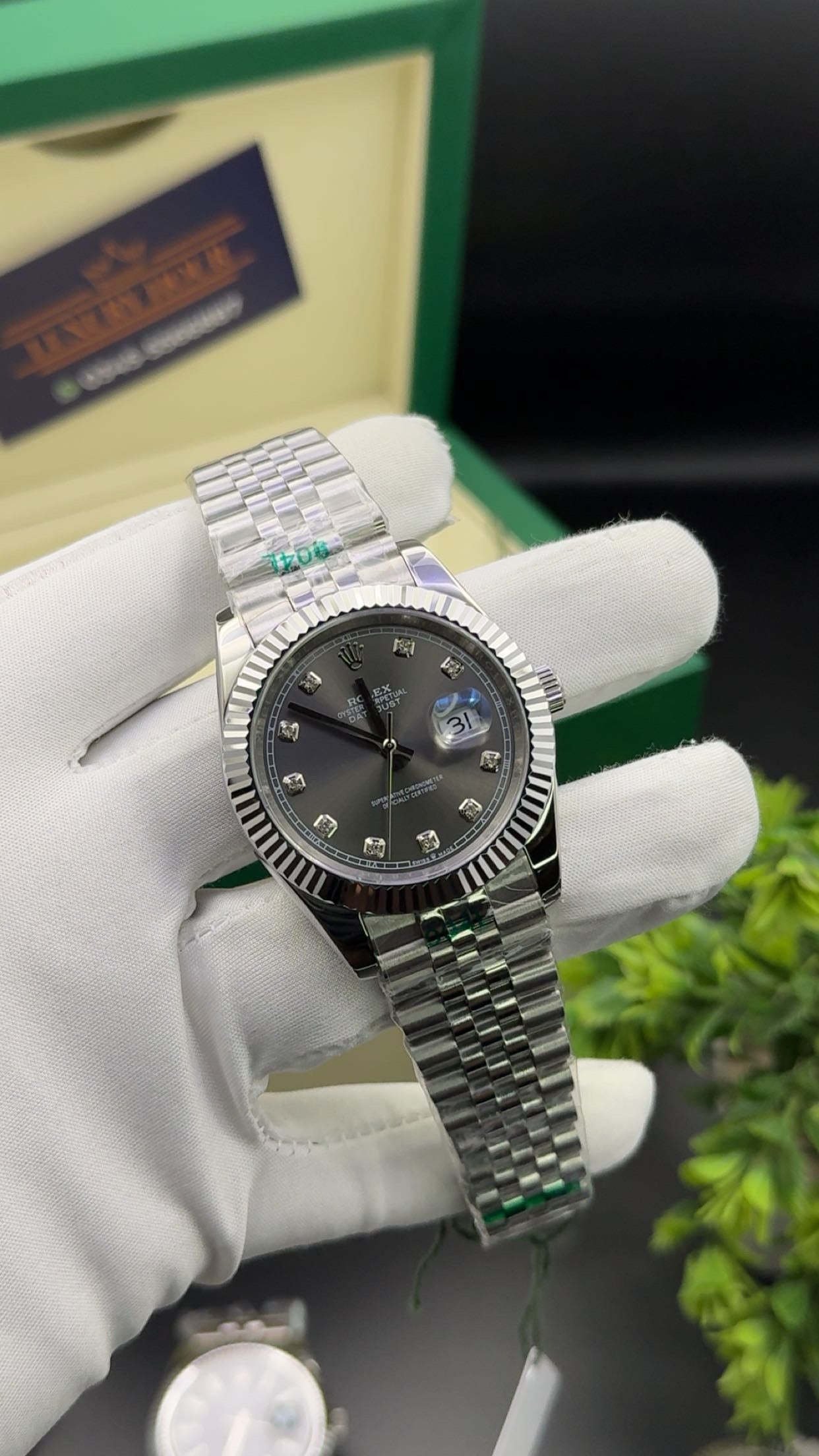 Silver with grey dial