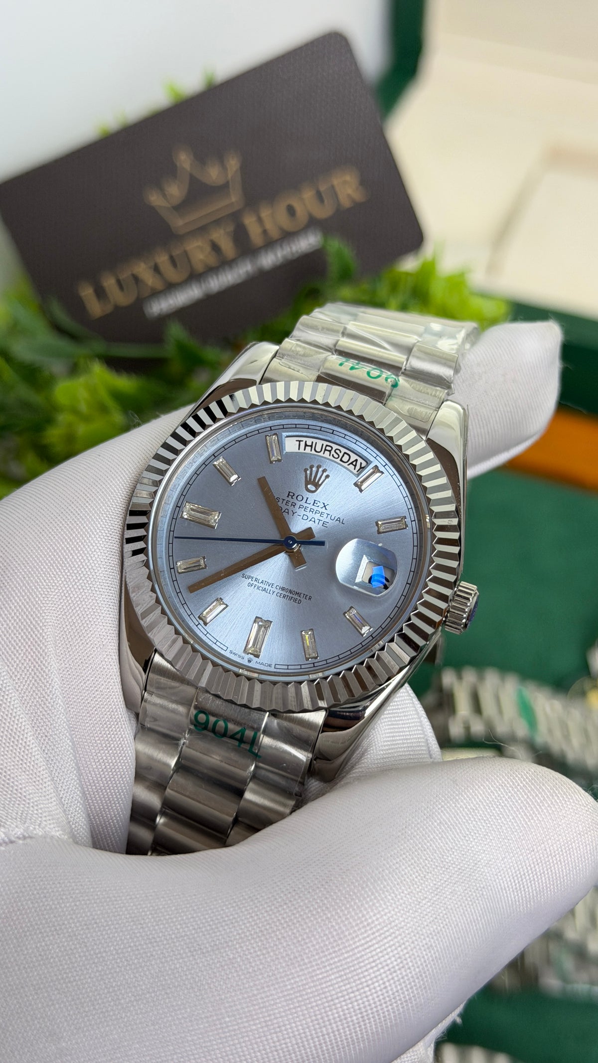 Silver with Blue Dial.