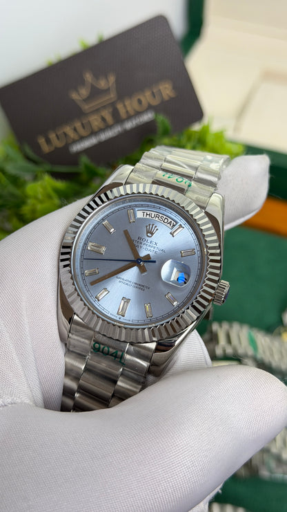 Silver with Blue Dial.