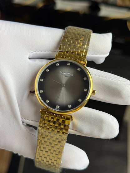 Yellow Gold with Grey Dial.