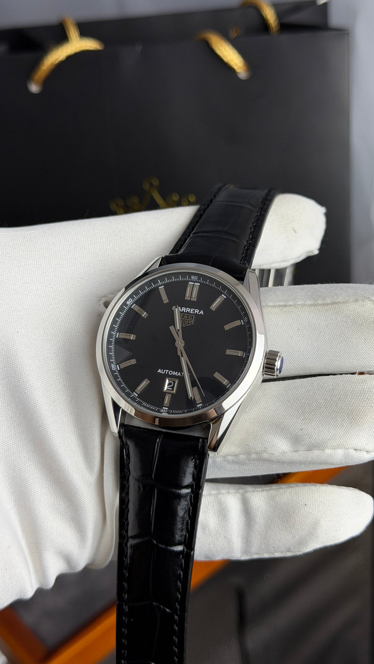 Silver with Black Dial.