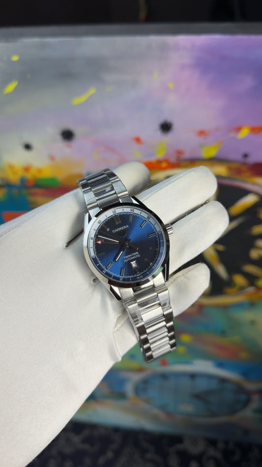 Silver with blue dial