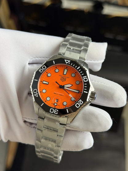 Silver with Orange Dial.