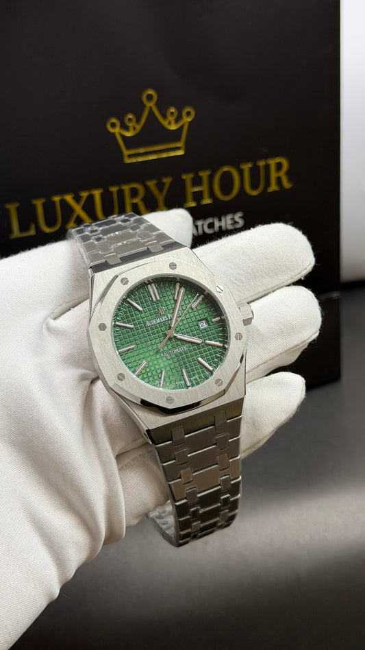 Silver with Green Dial.