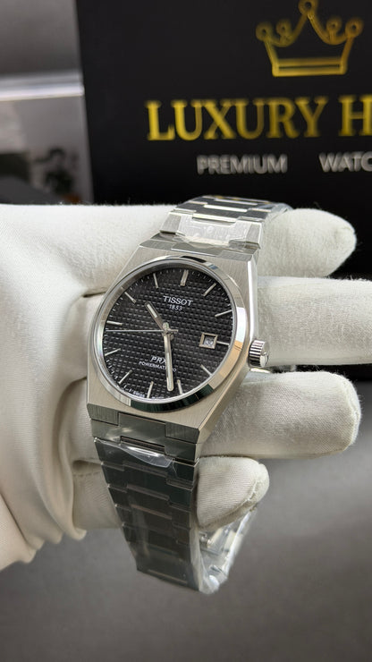 Silver with Black Dial.