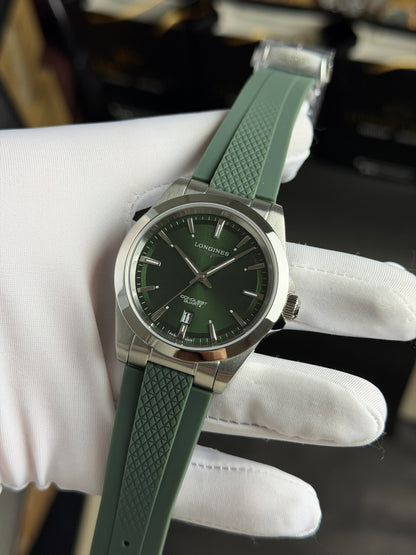 Silver with Green Dial.