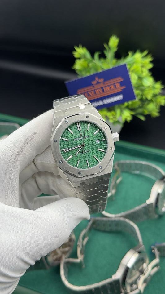 Silver with green dial