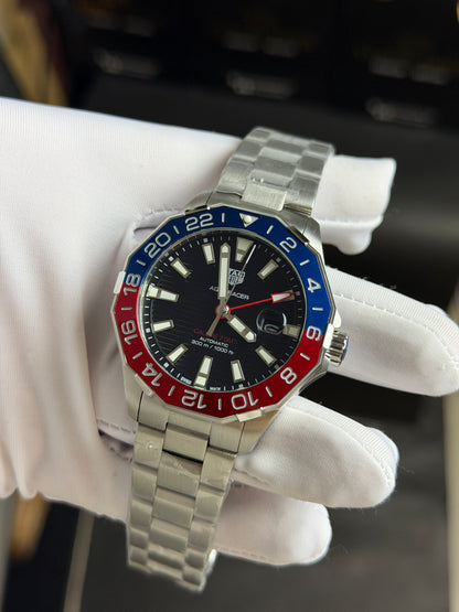 Silver with Black Dial.