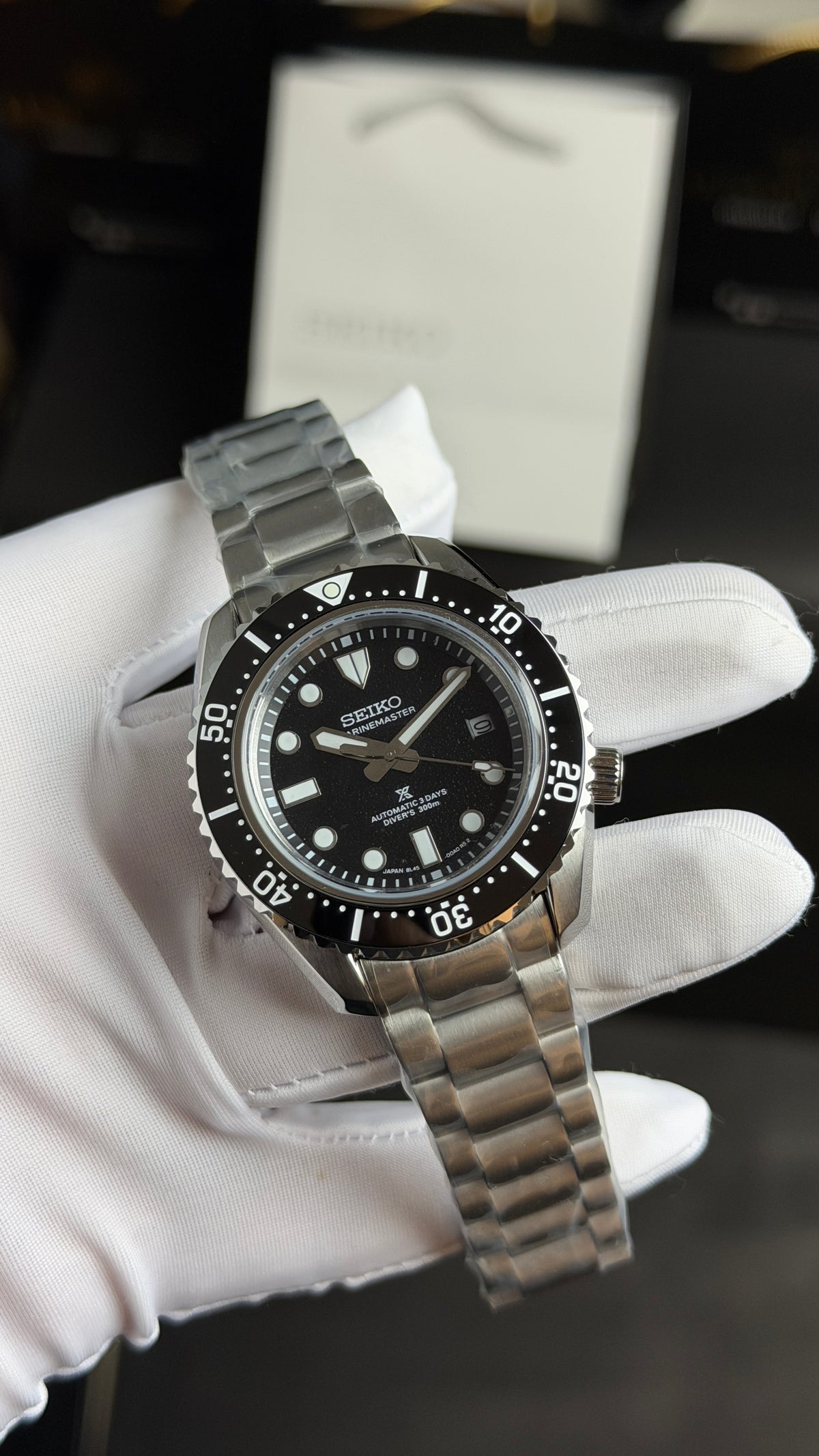 Silver with Black Dial.