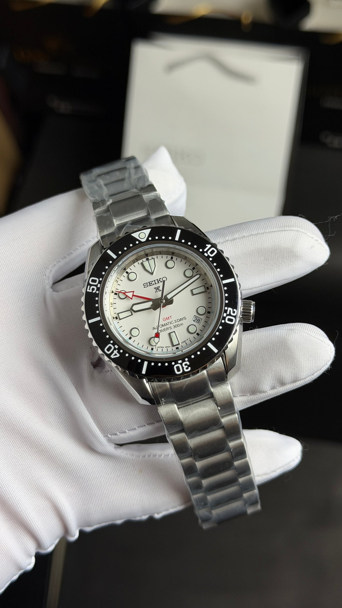 Silver with White Dial.