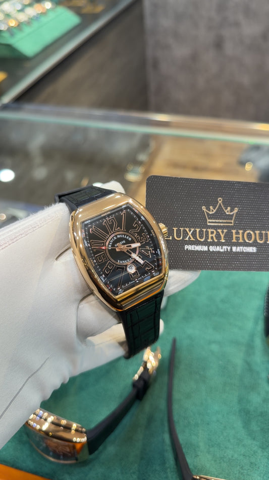 Rose Gold with Black Dial.