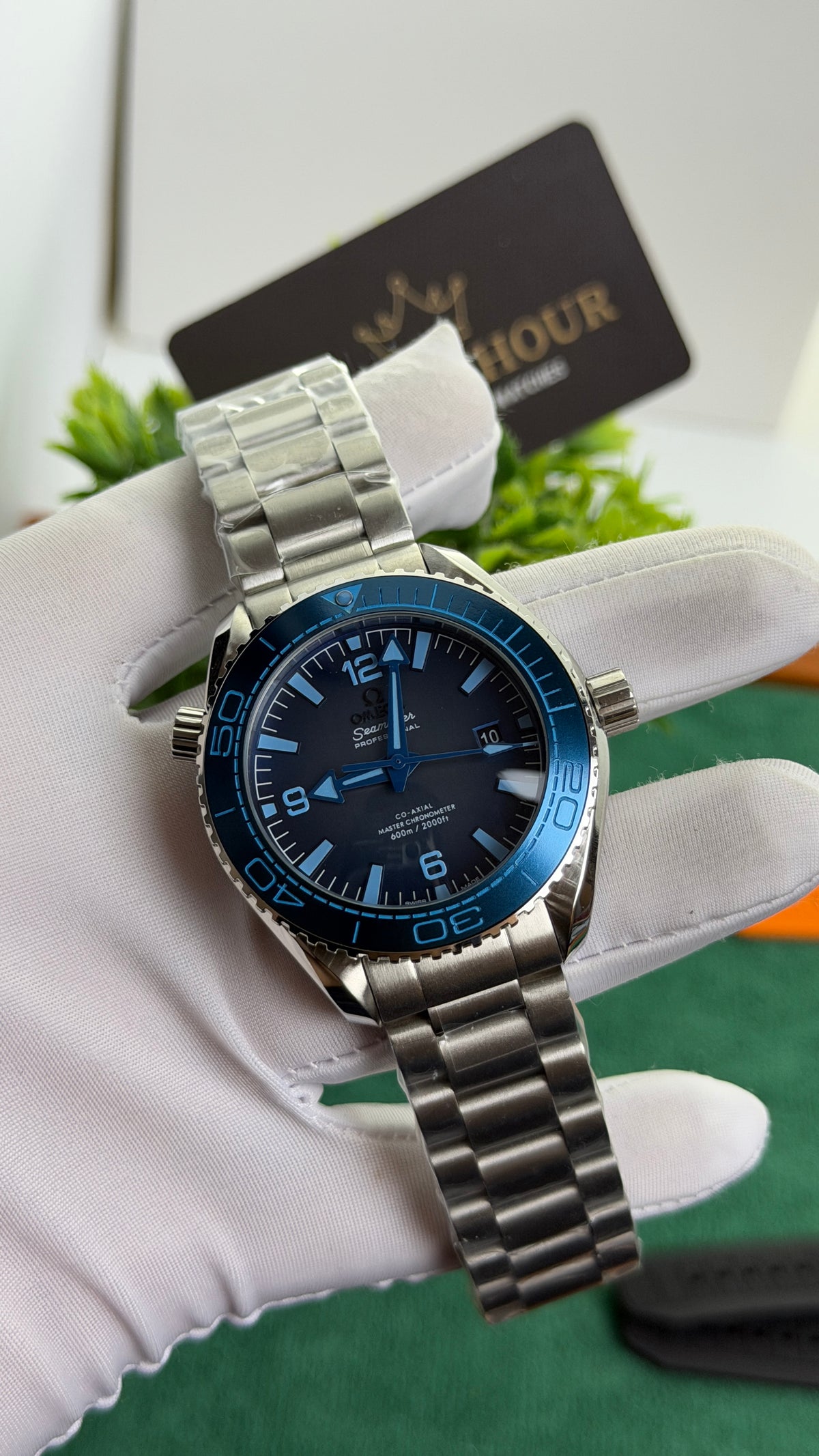 Silver with Blue Dial.