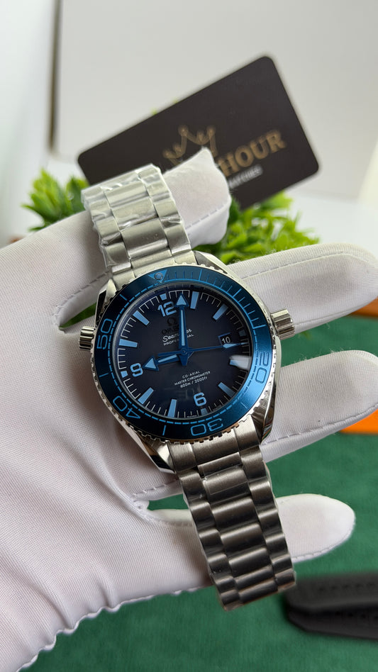 Silver with Blue Dial.