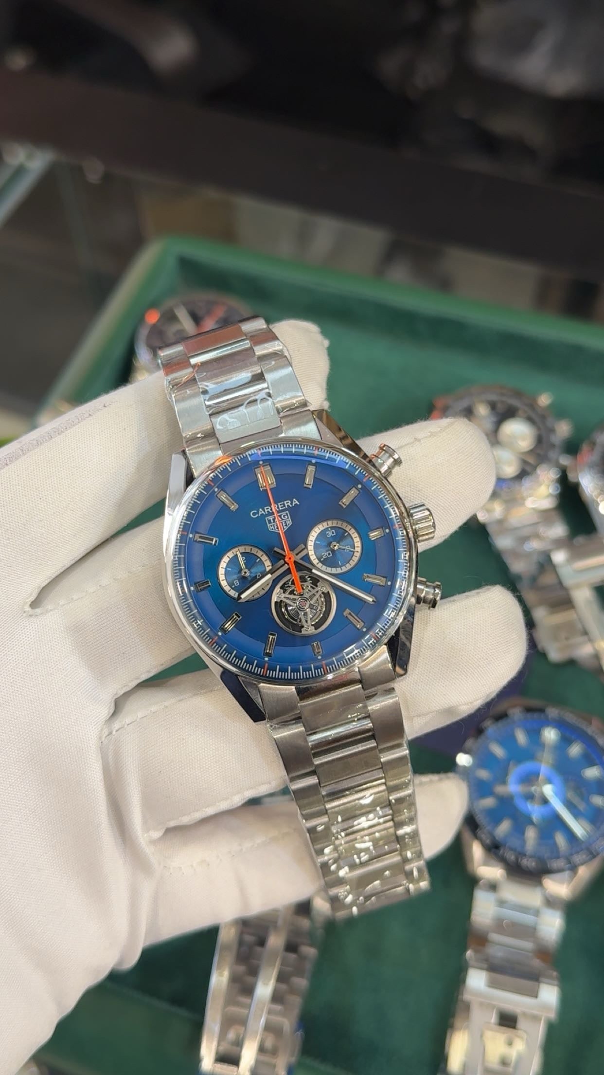 Silver with blue dial