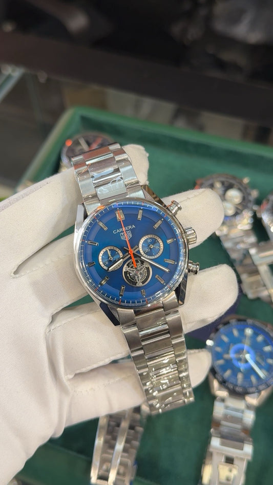 Silver with blue dial