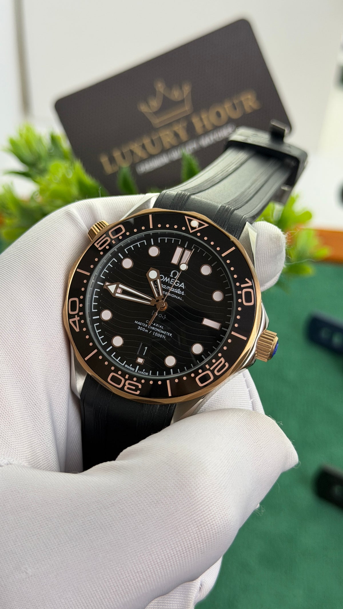 Rose Gold with Black Dial.