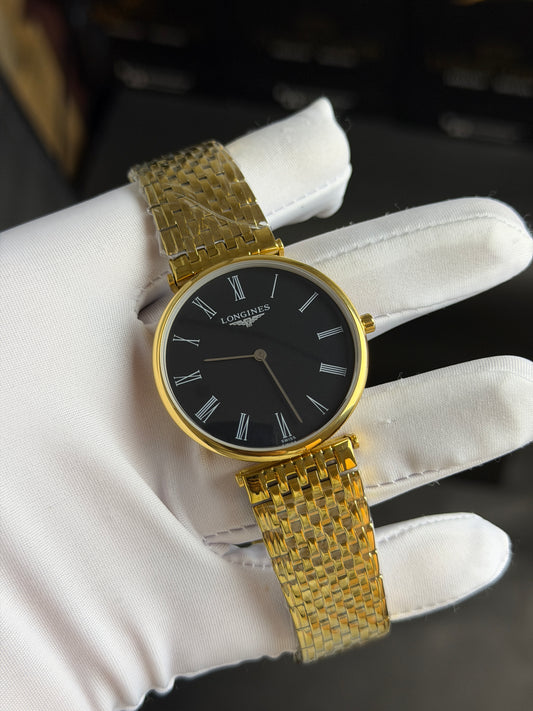 Yellow Gold with Black Dial.
