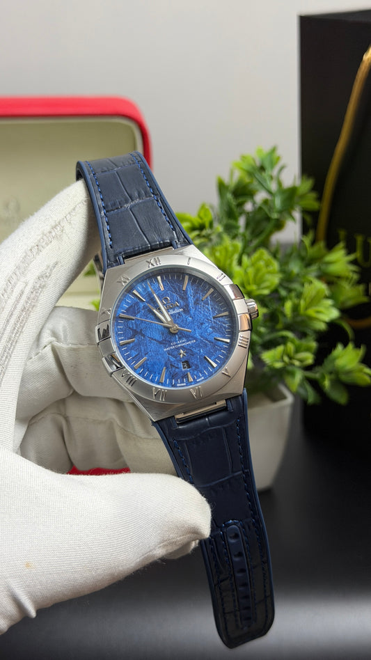 Silver with Blue Dial.