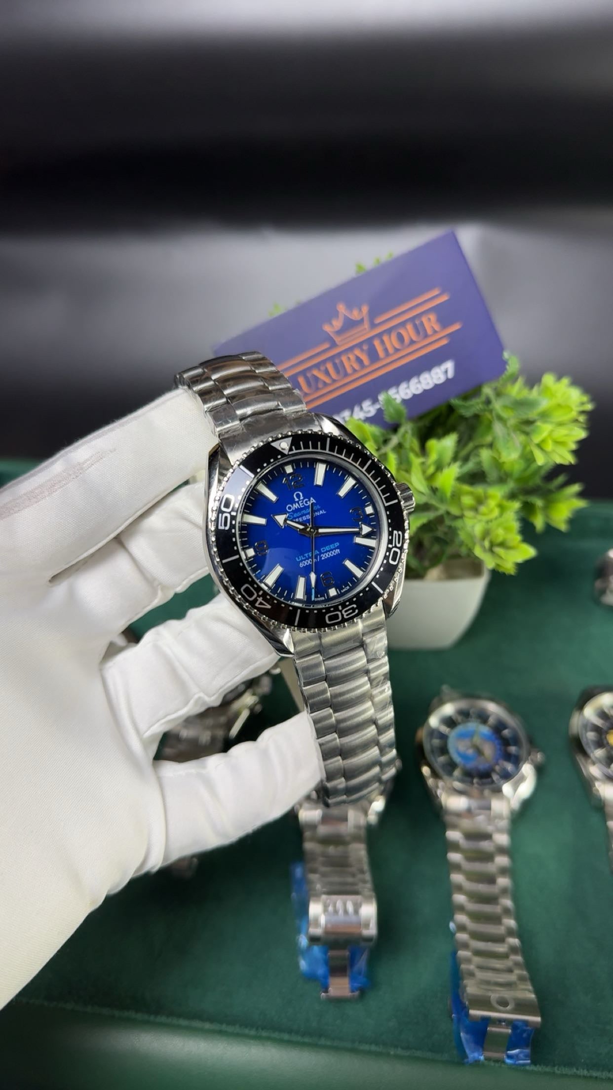 Silver with blue dial