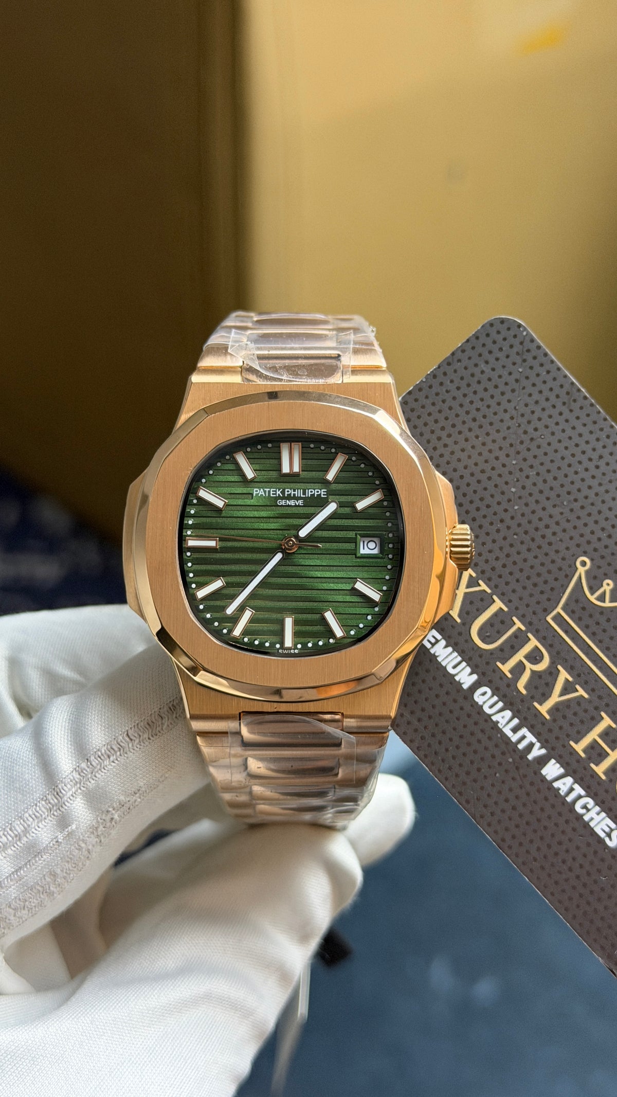 Rose Gold with Green Dial.