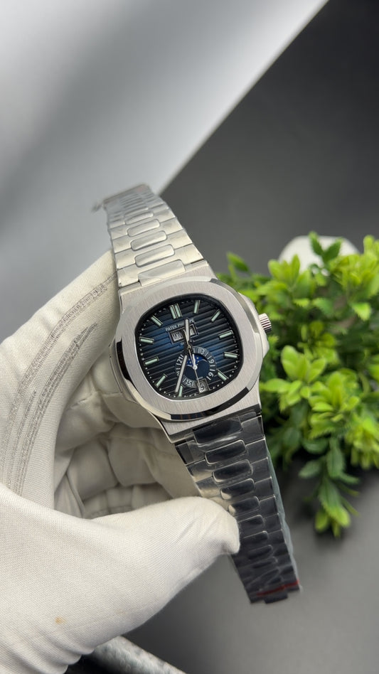 Silver with blue dial🔥