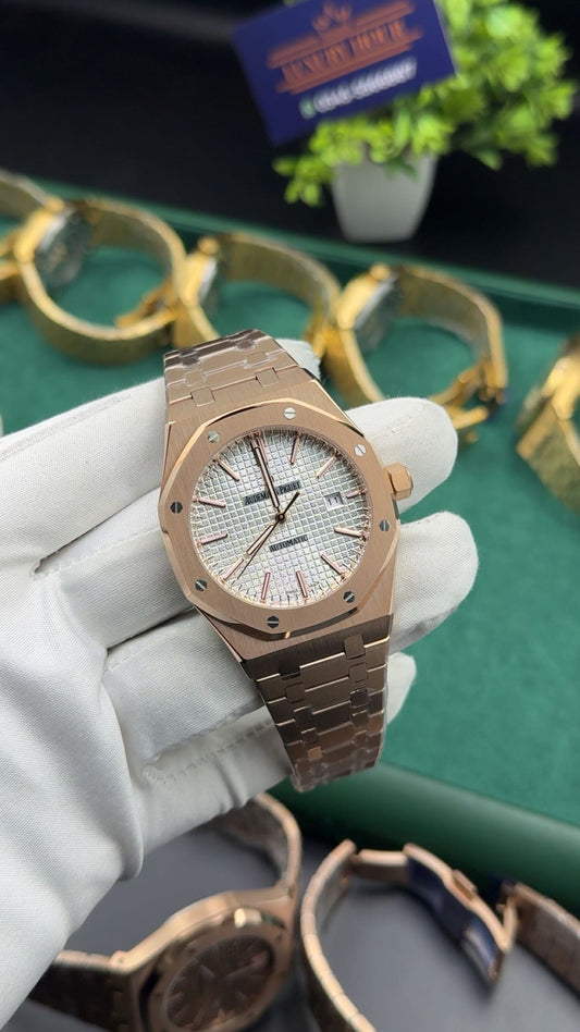 Rose gold with white dial