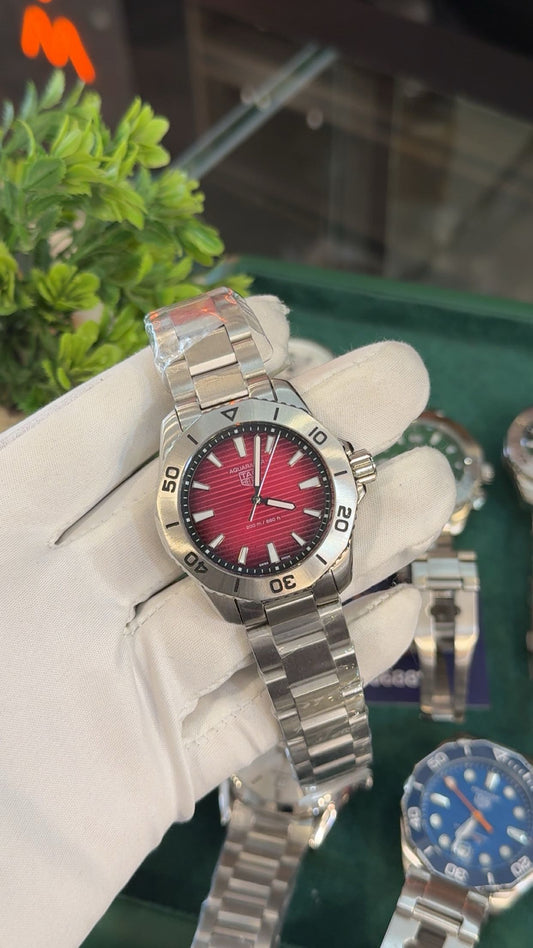 Silver with red dial