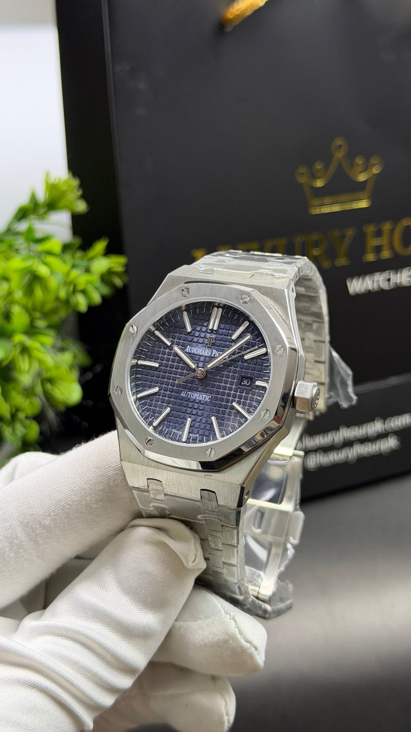 Silver with Blue Dial.