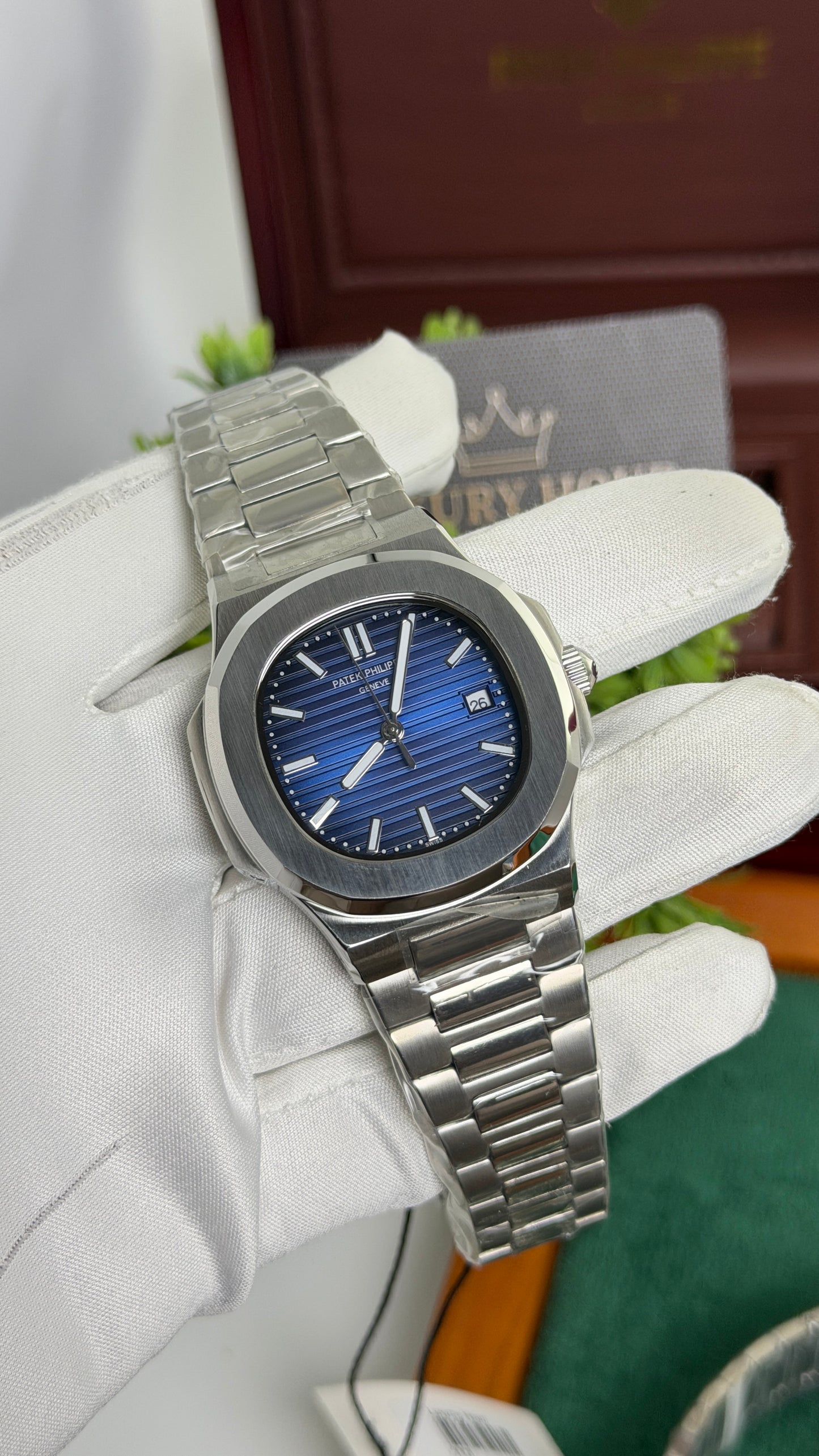 Silver with Blue Dial.