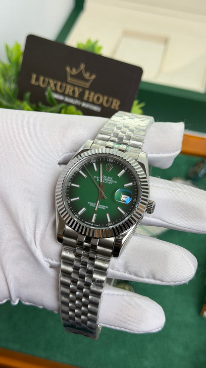 Silver with Green Dial.