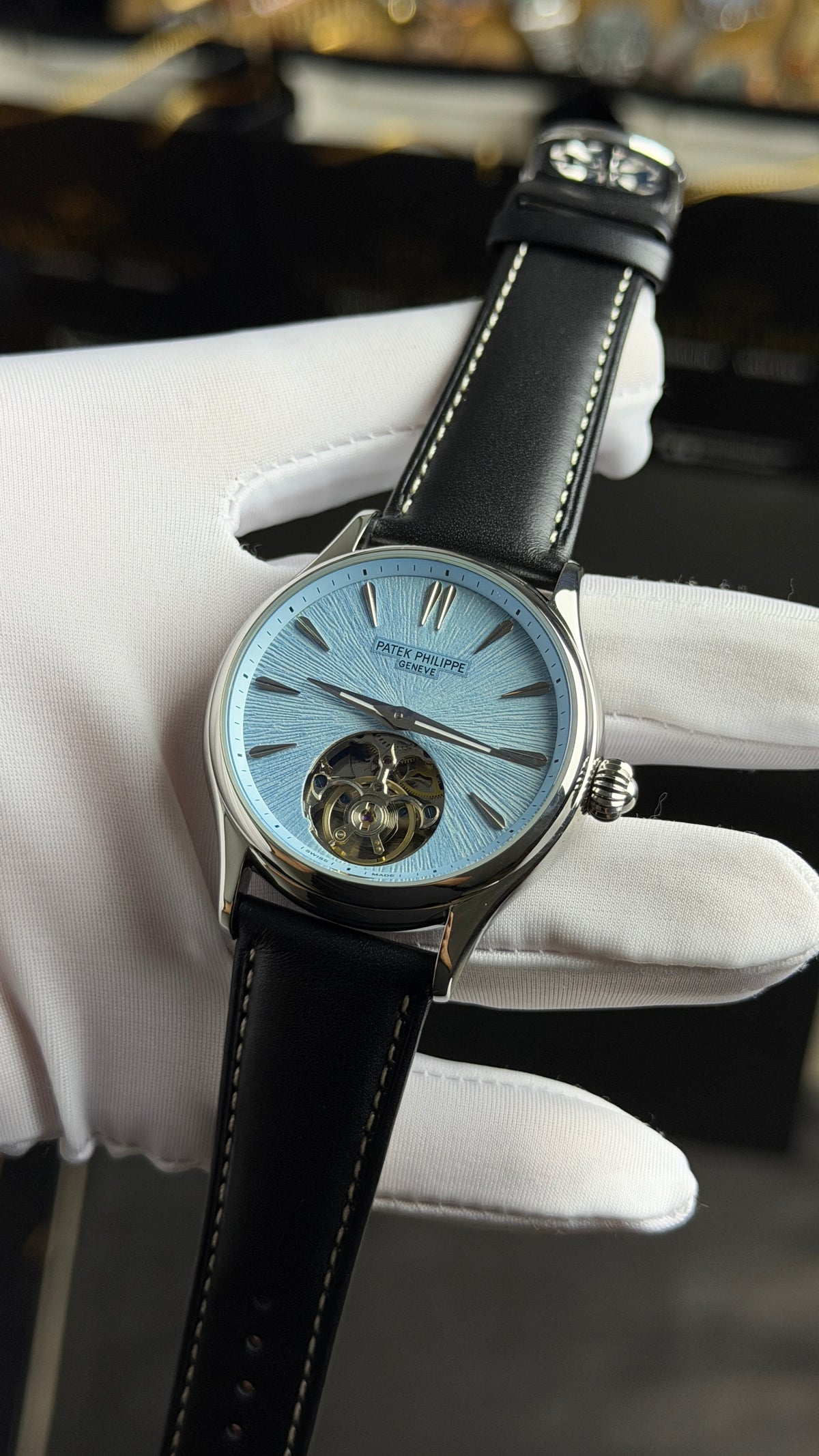Silver with Sky Blue Dial.