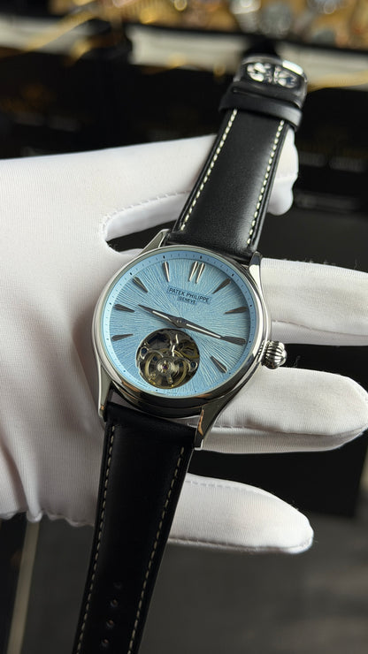 Silver with Sky Blue Dial.