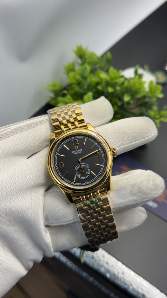 Yellow gold classic beauty with black dial.